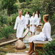 Load image into Gallery viewer, Group of friends enjoy hot springs on Hike & Seek Mornington Peninsula day tour
