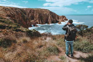 Guy takes photo of Bass Strait at Phillip Island Hike & Seek