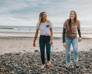 Friends walk along beach during Hike & Seek Phillip Island day tour